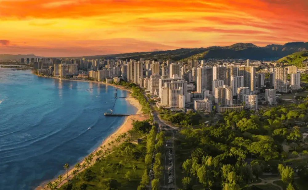 Honolulu with a vibrant red sunset